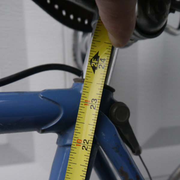 Measure to the top of the seat tube.