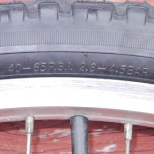 Bike tire air pressure molded in the tire's sidewall. I orient this information near the valve stem to make it easy to find.
