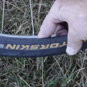 Checking the tire for punctures.