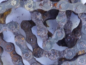 This bicycle chain is too rusty to be saved.