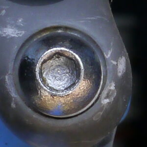 Brake bolt after immersion in Evapo-Rust, which is the best rust remover for bikes.